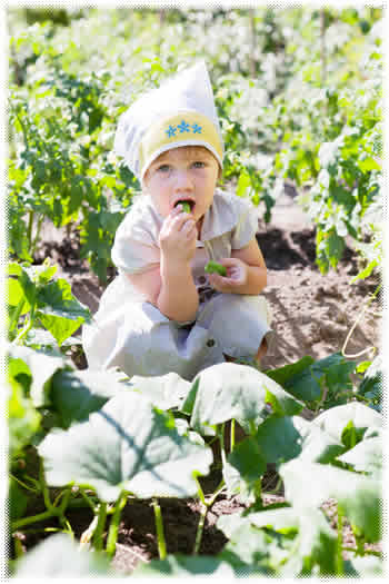 girl eating garden plant