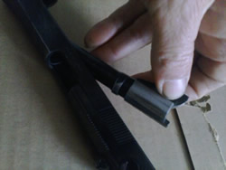 How to Clean a 1911 - Barrel removal on 1911 pistol.