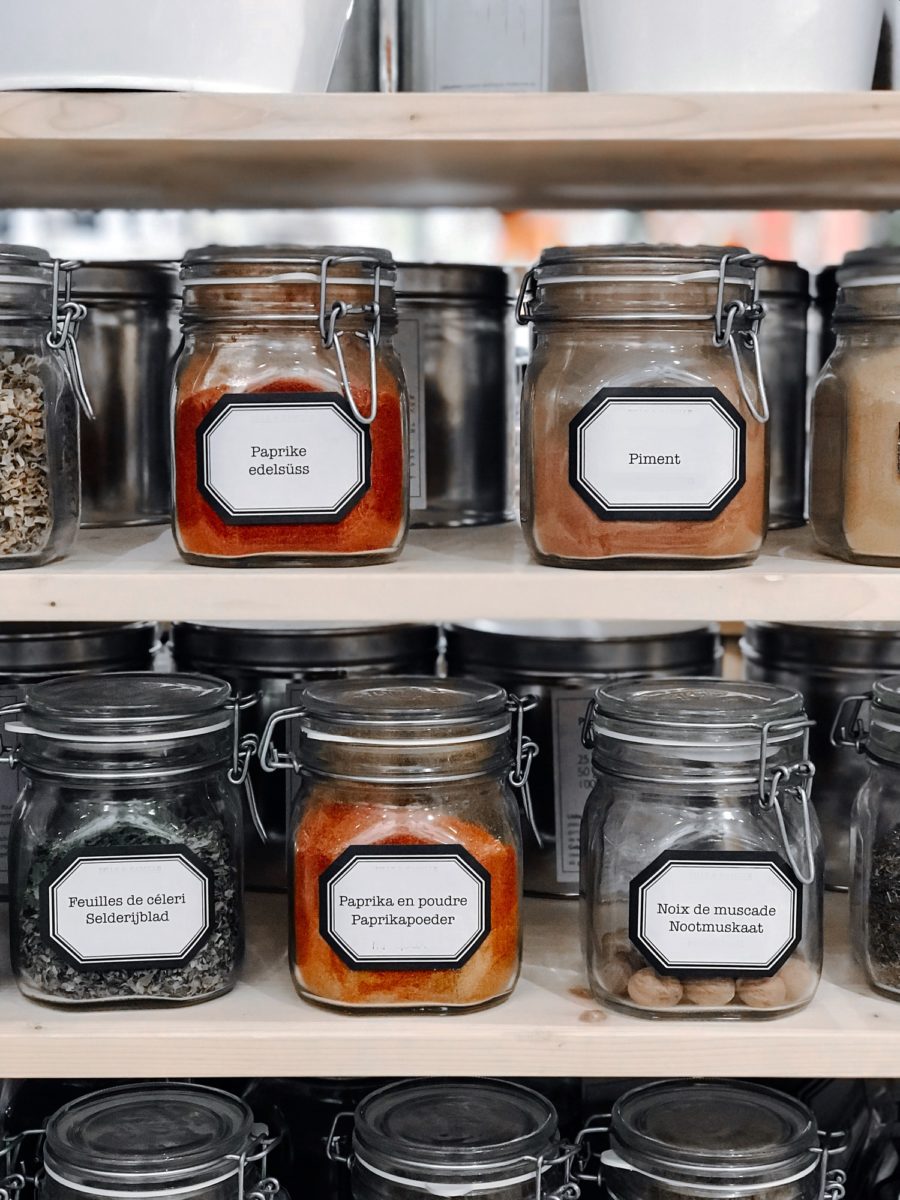 Cans with spices at the shelves