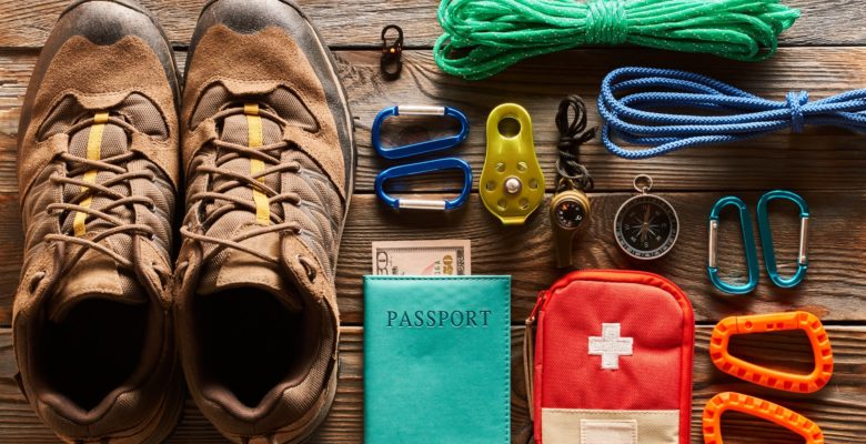 Travel items for hiking flat lay